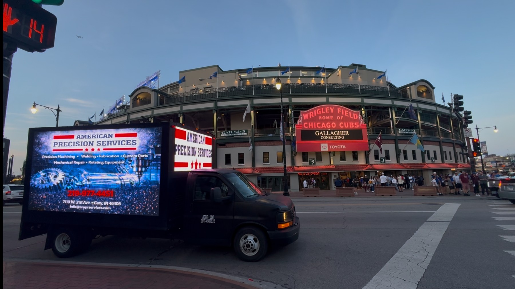 AOTC mobile LED truck for American Precision Services parked outside Wrigley Field, home of the Chicago Cubs