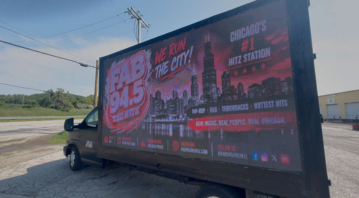 AOTC mobile LED truck displaying the FAB 94.5 The Hitz creative