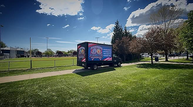 AOTC mobile LED truck parked beside the Hammond Hermits baseball field during the opening ceremony