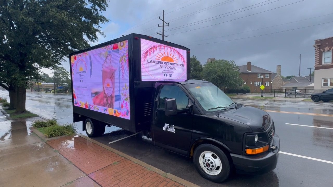 Close view of the AOTC LED board running Lakefront Nutrition & Fitness creative during the Hammond route